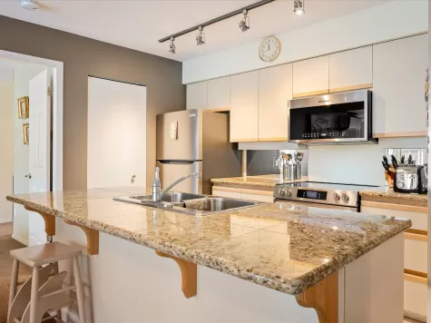 205 3217 BLUEBERRY DRIVE image #2